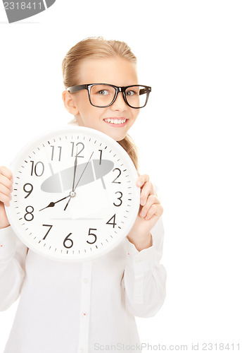 Image of girl holding big clock