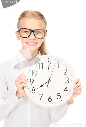 Image of girl holding big clock