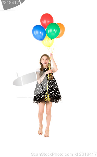 Image of happy girl with colorful balloons