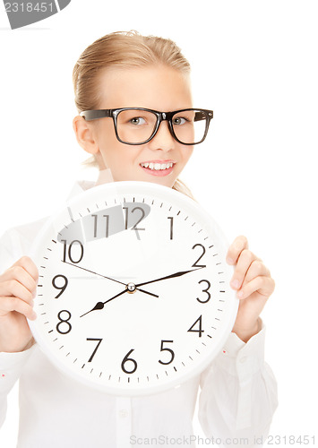 Image of girl holding big clock