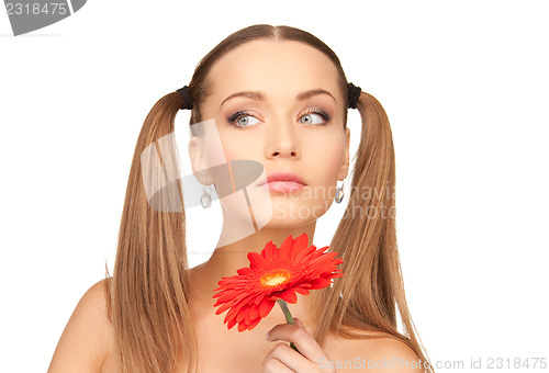 Image of woman with red flower