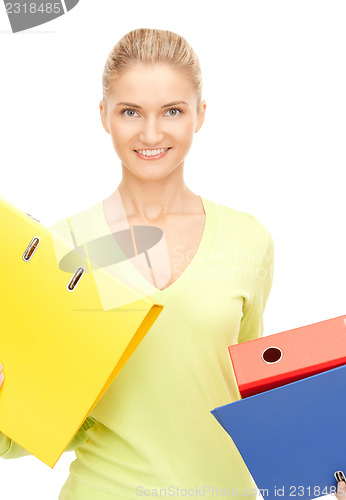 Image of businesswoman with folders