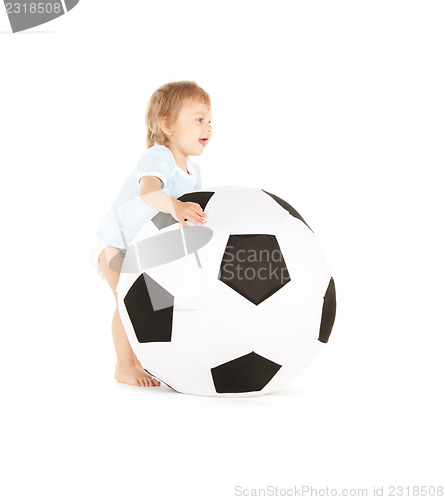 Image of baby boy with soccer ball