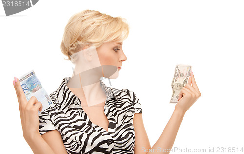 Image of woman with euro and dollar