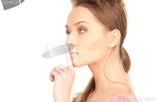 Image of finger on lips