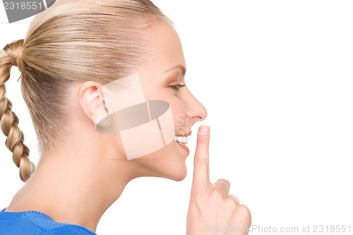 Image of finger on lips