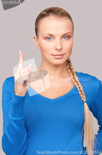 Image of woman with her finger up 