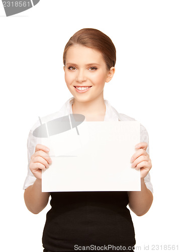 Image of happy teenage girl with blank board