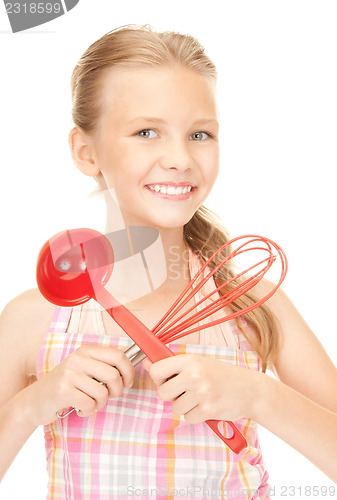 Image of little housewife with red ladle