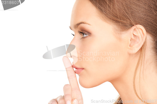 Image of finger on lips