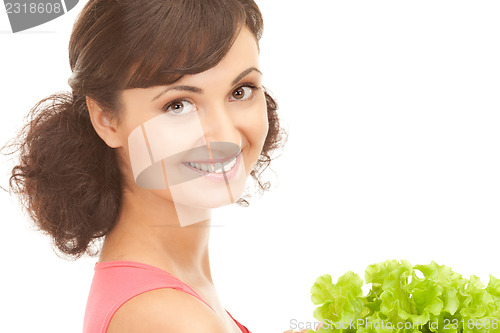 Image of woman with lettuce