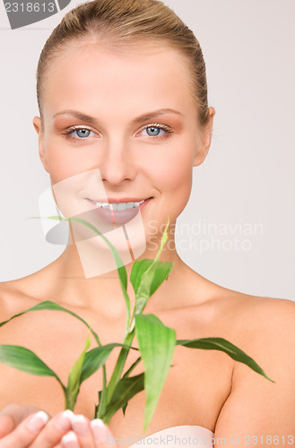 Image of woman with sprout