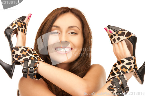 Image of lovely woman with leopard shoes