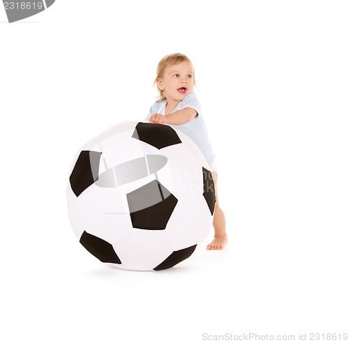 Image of baby boy with soccer ball