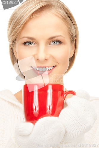 Image of beautiful woman with red mug