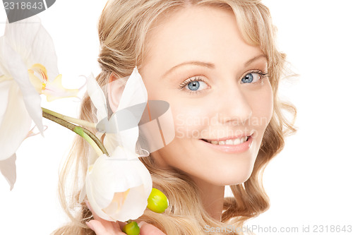 Image of beautiful woman with white flower