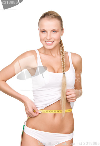 Image of beautiful woman with measure tape