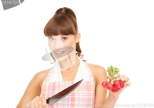 Image of housewife with big knife and radish