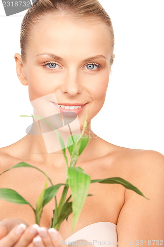 Image of woman with sprout