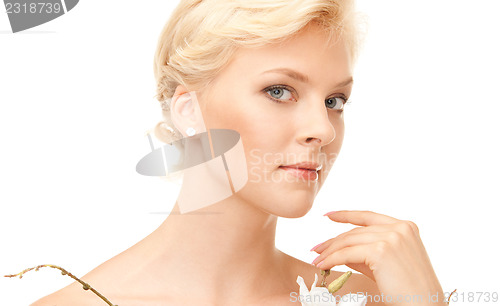 Image of lovely woman with twig