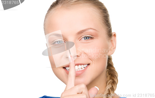 Image of finger on lips