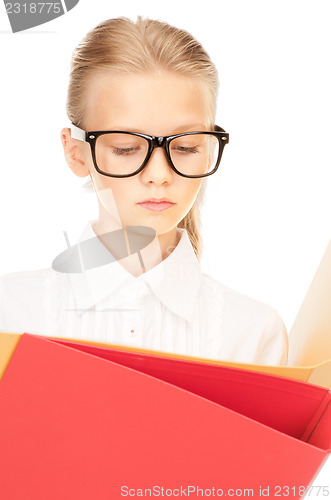 Image of elementary school student with folders