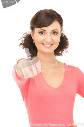 Image of attractive businesswoman pointing her finger