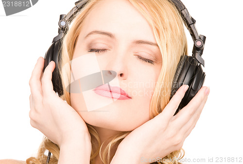 Image of happy woman in headphones