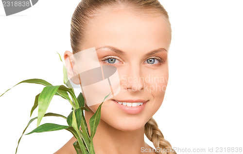 Image of woman with sprout