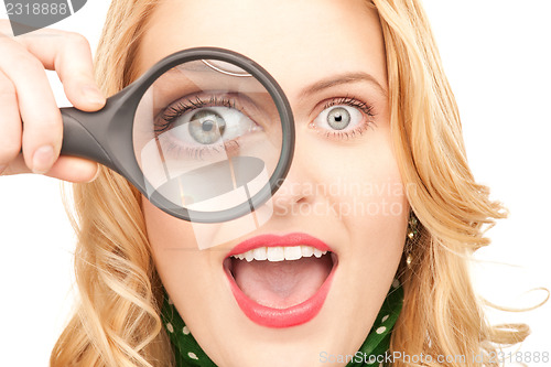 Image of woman with magnifying glass