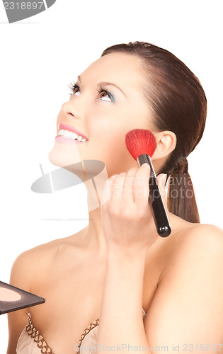 Image of lovely woman with palette and brush