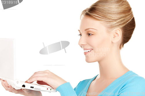 Image of happy woman with laptop computer