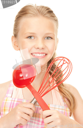 Image of little housewife with red ladle