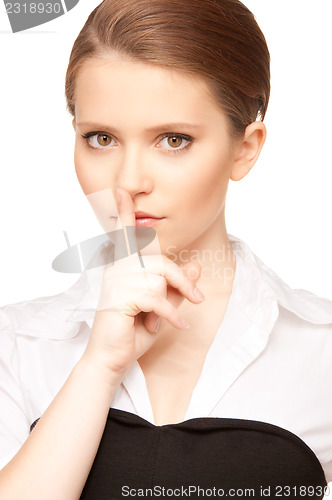 Image of finger on lips 