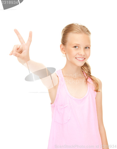 Image of lovely girl showing victory sign