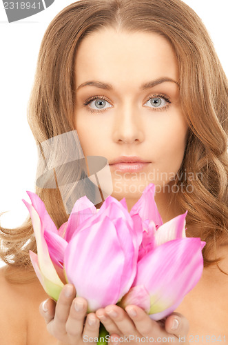 Image of beautiful woman with lotus flower 