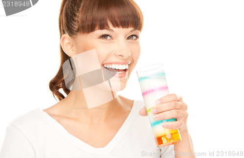 Image of lovely woman with glass of milk