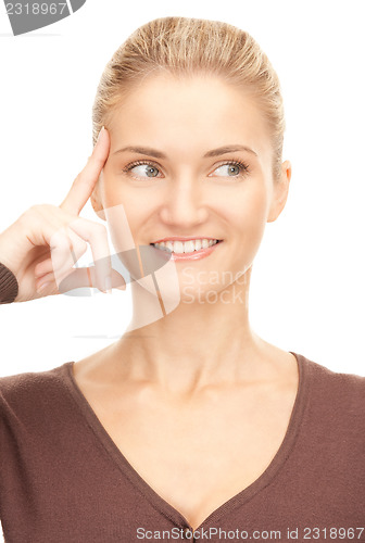 Image of pensive businesswoman over white