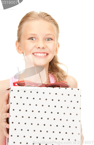 Image of happy girl with gift box
