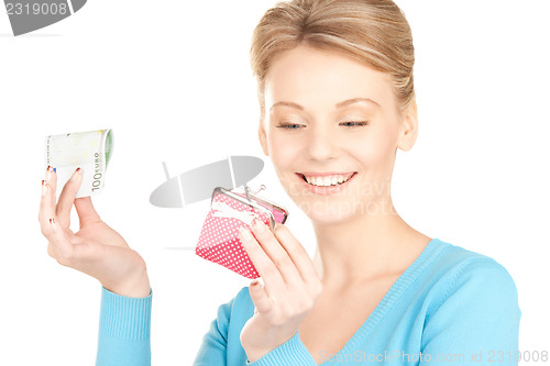 Image of lovely woman with purse and money