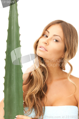 Image of lovely woman with aloe vera