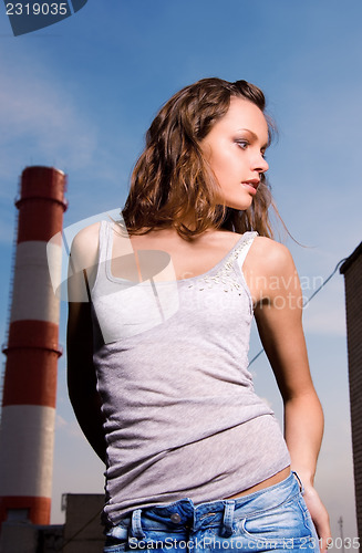 Image of young sexy woman in blue jeans