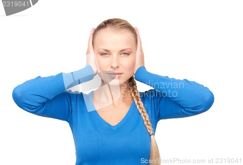 Image of woman with hands on ears