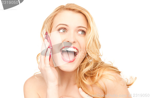 Image of happy woman with cell phone