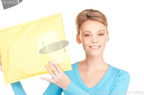 Image of businesswoman with parcel