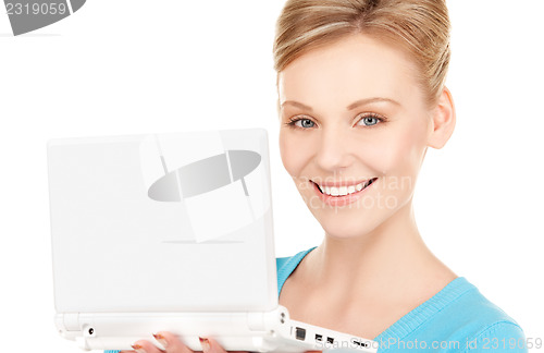 Image of happy woman with laptop computer