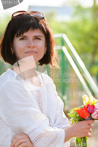 Image of Woman with flowers