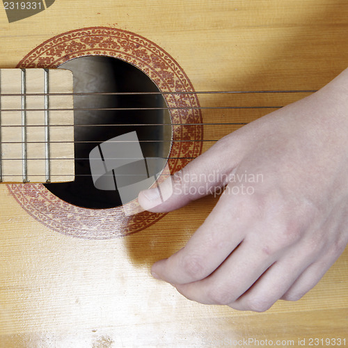 Image of Playing the guitar