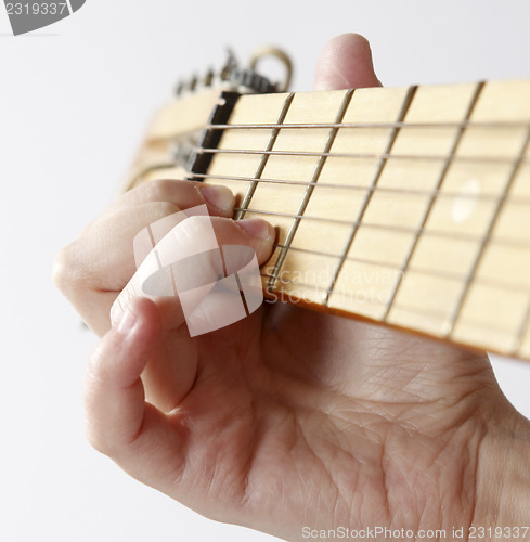 Image of Playing the guitar