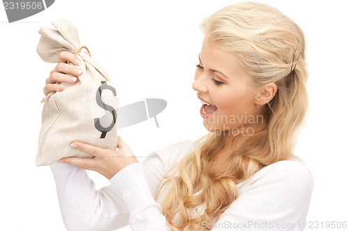 Image of woman with dollar signed bag